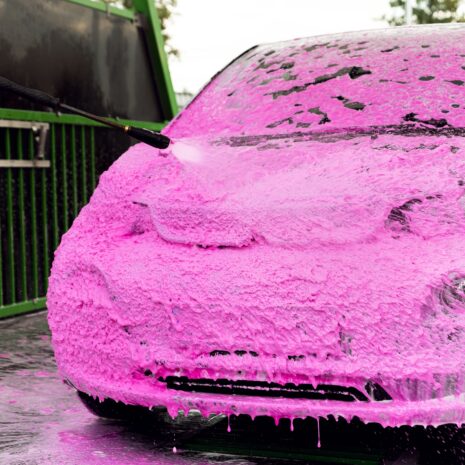 Car,In,Pink,Foam,Standing,At,A,Self-service,Car,Wash. 2020 Polychrom active foam 55 pink